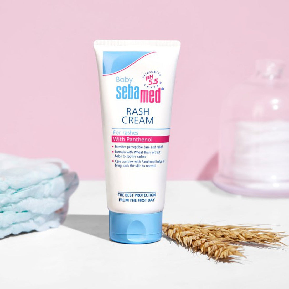 Texture close‑up of Sebamed cream on fingertip